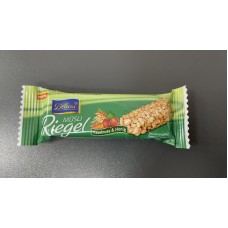 Злаковий батончик Delicia мед та горішки 25 гр.
